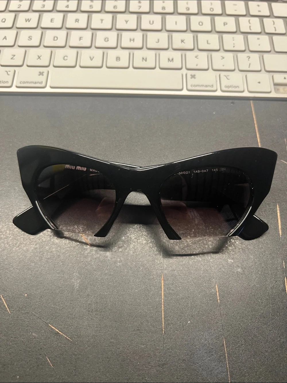 Miu Miu Black Cat-Eye Sunglasses with Gradient Lenses